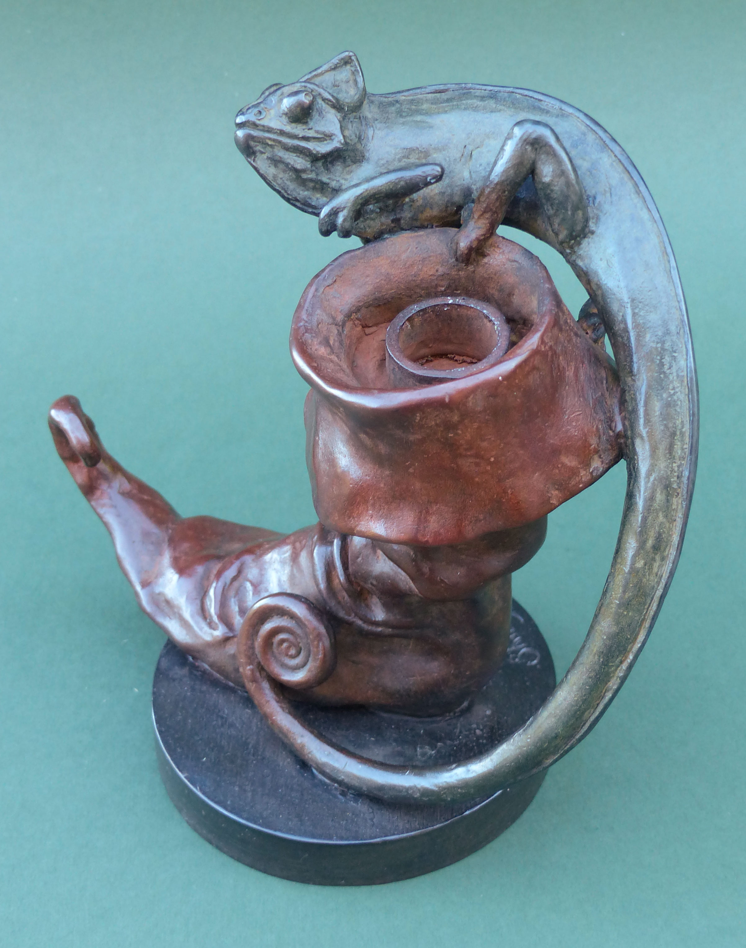 Boot and chameleon candlestick